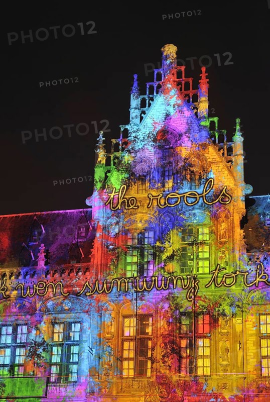 Monumental light projections on facade of Post Plaza by the French artist group Spectaculaires during the 2011 light festival of Ghent