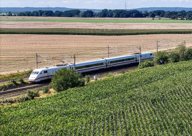 An ICE with two wagons on the open track