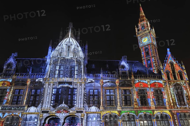 Monumental light projections on facade of Post Plaza by the French artist group Spectaculaires during the 2011 light festival of Ghent
