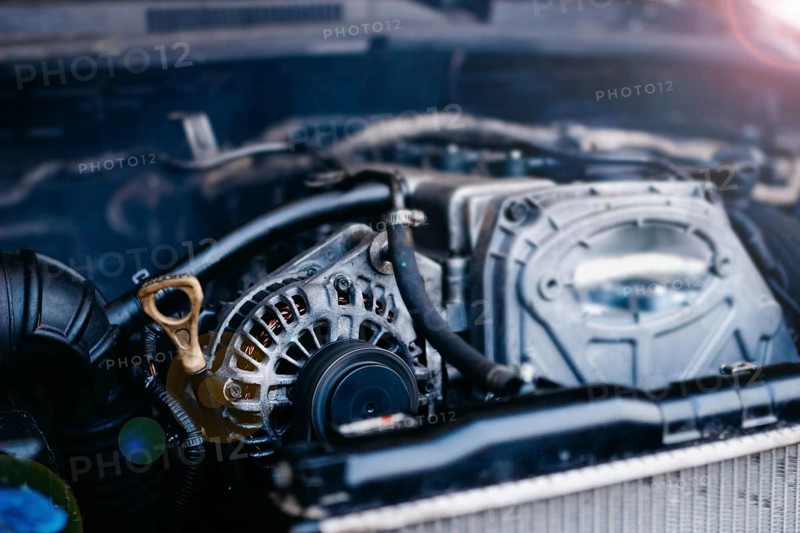 Generator in a car near an internal combustion engine