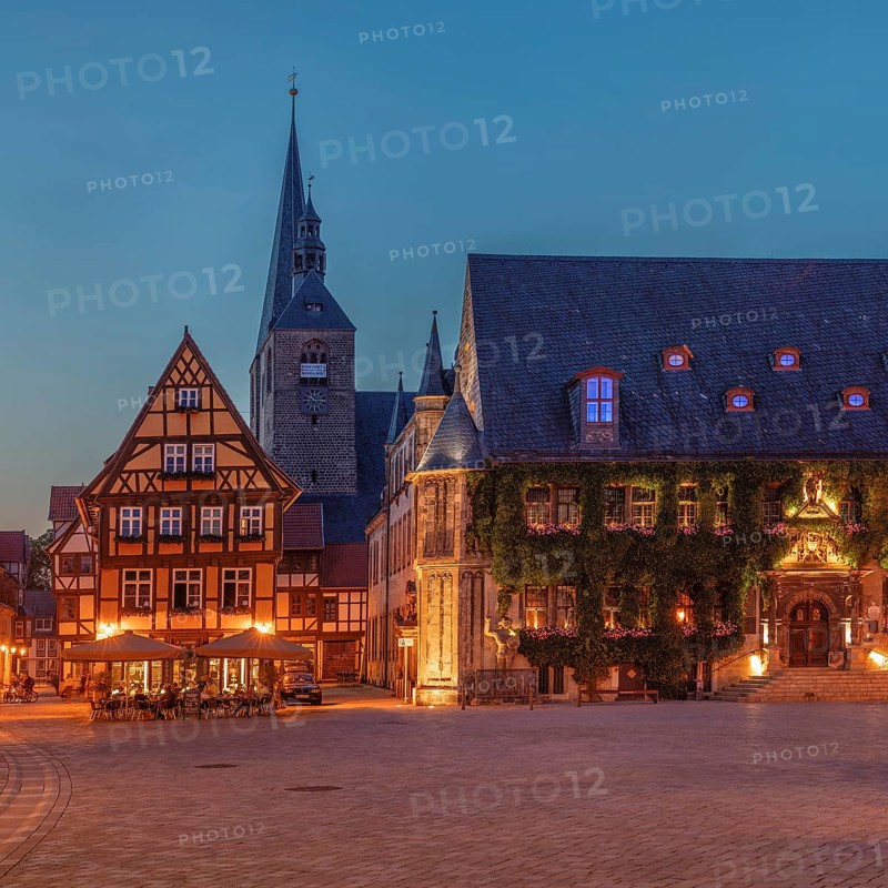 Cafe on the market square with St Benedikti church and town hall