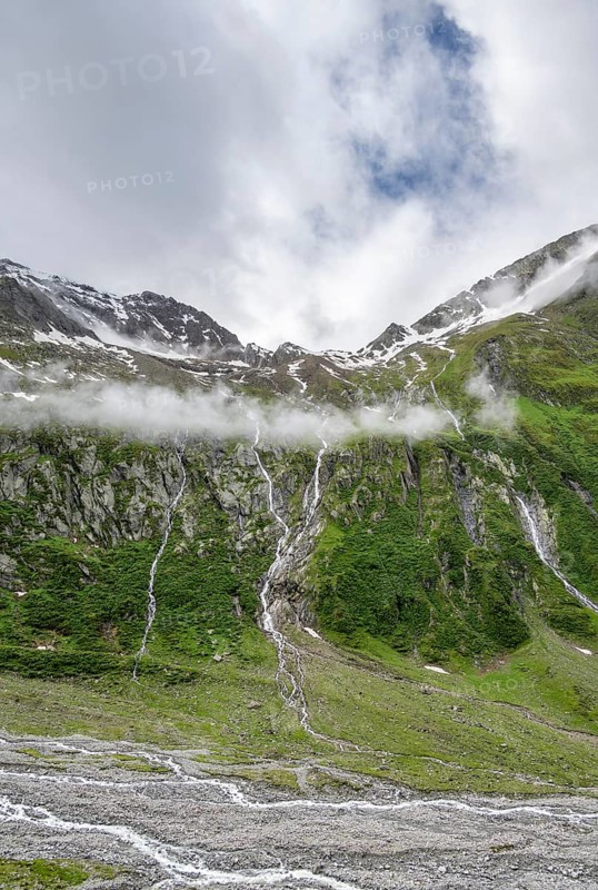 Mountain streams flow over steep mountain slopes into the Schlegeisgrund valley, cloudy rocky mountains, Furtschaglhaus, Berliner Hoehenweg, Zillertal, Tyrol, Austria, Europe