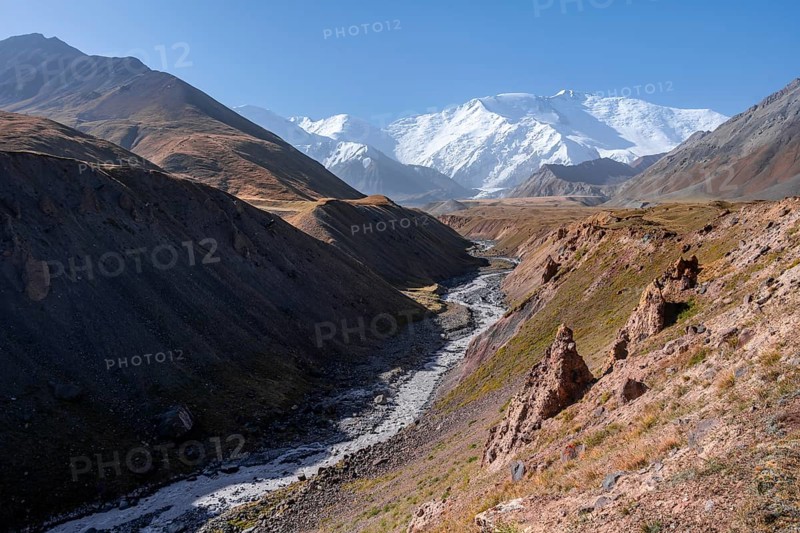 Valley with river Achik Tash between high mountains, mountain landscape with peak Pik Lenin, Osh province, Kyrgyzstan, Asia