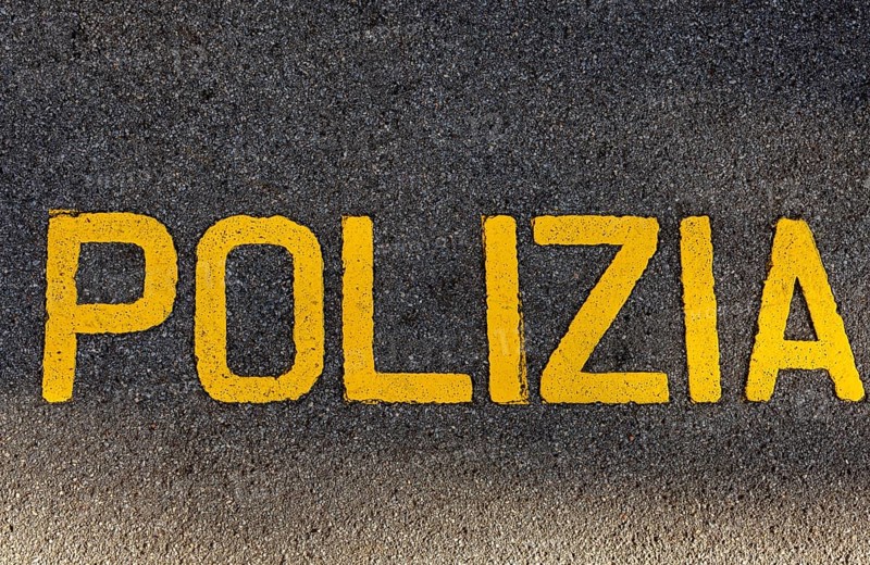 Police Written on the Asphalt Street in Italian Language in a Sunny Day in Lugano, Ticino, Switzerland, Europe