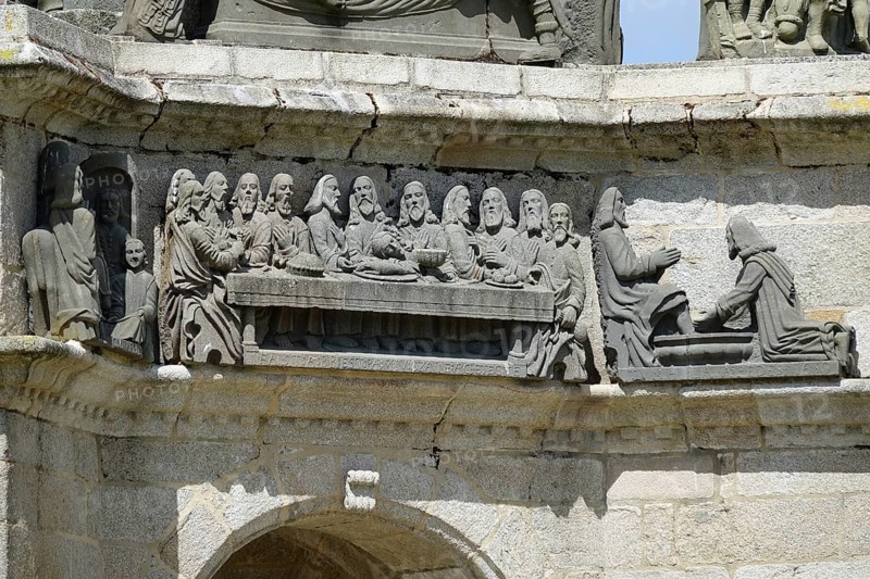 Stone reliefs Entrance into Jerusalem, Last Supper and Washing of the Feet, Calvary Calvaire, Enclos Paroissial de Pleyben enclosed parish from the 15th to 17th century, Finistere department, Brittany region, France, Europe