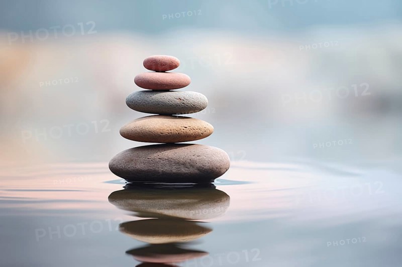Stack of zen stones on water with a nature background. The image conveys a sense of balance, harmony, and peace. Suitable for use in wellness, therapy, and relaxation concepts, AI generated