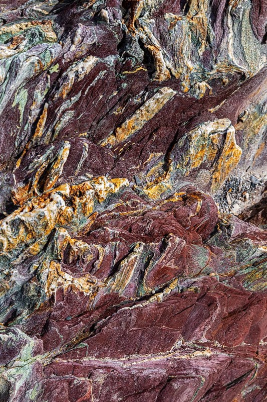 Coloured, ferrous mineral rocks on the beach of Topinetti, near Rio Marina, Elba, Tuscan Archipelago, Tuscany, Italy, Europe