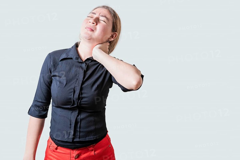 Young woman with muscle tension and neck pain isolated. Stress and neck pain concept, Girl suffering from neck pain isolated
