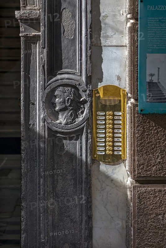 Relief of a bust of a Caesar on the entrance portal of a former palazzo, historic centre, Genoa, Italy, Europe
