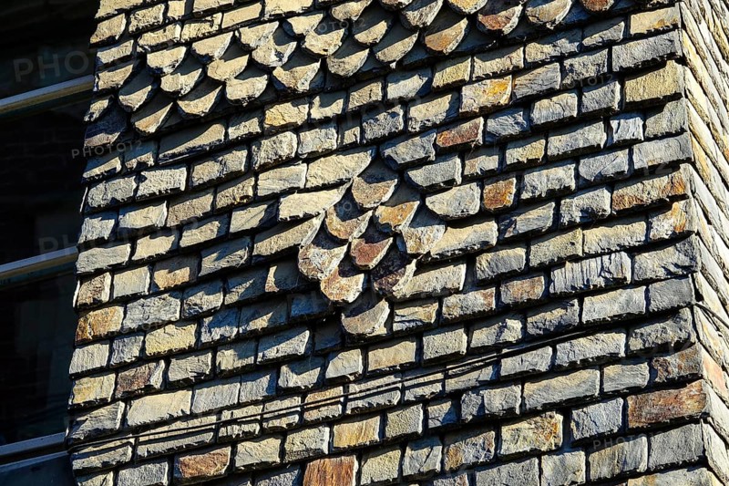 Detail of the shingle-clad facade of an old house in Rue Ange de Guernisac, Morlaix Montroulez, Finistere Penn Ar Bed department, Bretagne Breizh region, France, Europe
