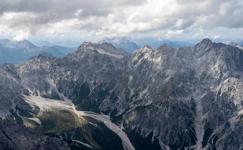 View of Wimbachgries valley and mountain panorama with rocky mountain peak of the Hochkalter, at the summit of the Watzmann Mittelspitze, Berchtesgaden National Park, Berchtesgaden Alps, Bavaria, Germany, Europe