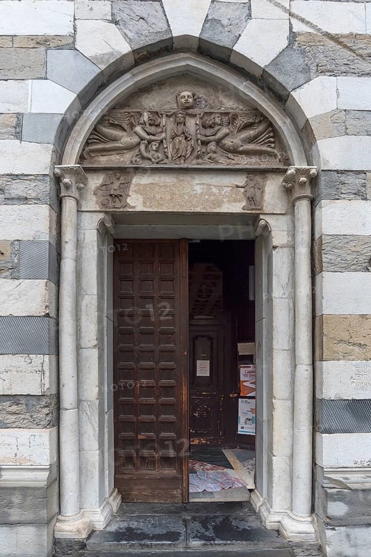 Side portal of the Romanesque Chiesa Parrocchia Abbazia di San Stefano, mentioned in 920, Piazza Santo Stefano, 2, Genoa, Italy, Europe