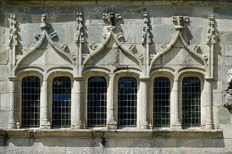 Window of the ossuary from the 16th century, Enclos Paroissial de Pleyben, Finistere department, Brittany region, France, Europe