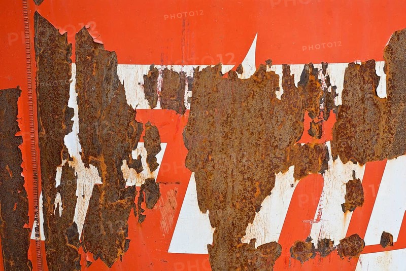 Rusty surface with peeling red paint and white stripes, weathering, symbol of decay, vacancy, need for renovation, ageing, background, Mecklenburg-Western Pomerania, Germany, Europe