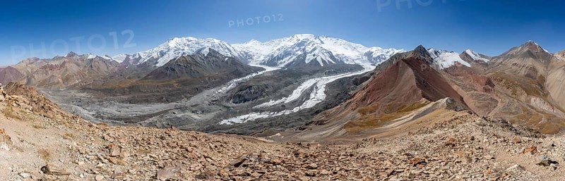 Panorama, high mountain landscape with glacier moraines and glacier tongues, glaciated and snow-covered mountain peaks, Lenin Peak and Peak of the XIX Party Congress of the CPSU, Traveller's Pass, Trans Alay Mountains, Pamir Mountains, Osh Province, Kyrgyzstan, Asia