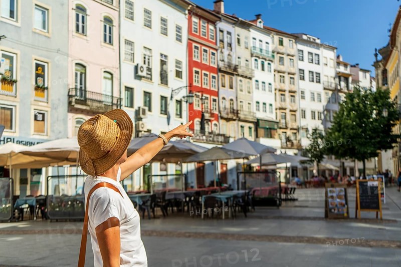 Woman sightseeing beautiful town, Coimbra, Portugal, Europe