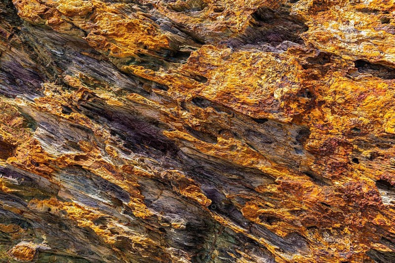 Coloured, ferrous mineral rocks on the beach of Topinetti, near Rio Marina, Elba, Tuscan Archipelago, Tuscany, Italy, Europe