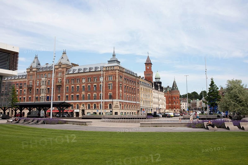 Angfaerjepark on the quay promenades, behind a traditional house and the town hall, Helsingborg, Skane laen, Sweden, Europe