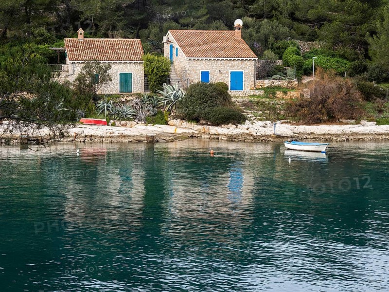 View from the promenade path to a small house by the sea, near Veli Losinj, Kvarner Bay, Croatia, Europe