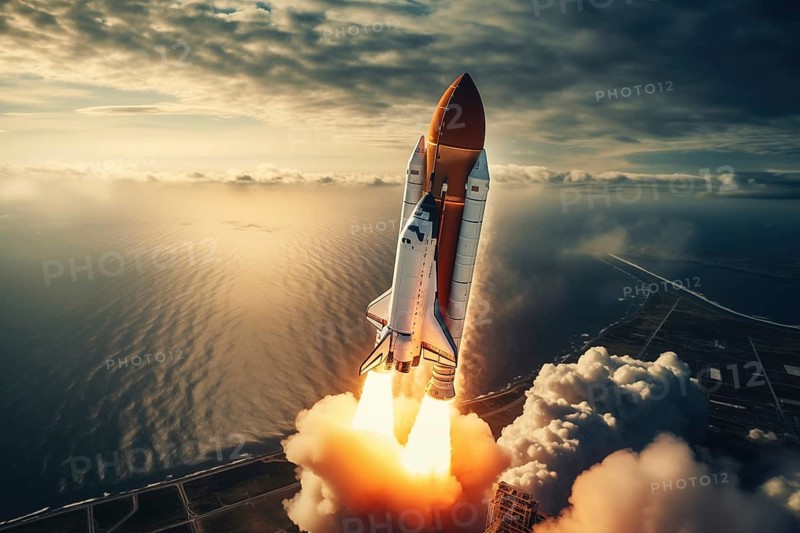Aerial view of a rocket shuttle carrier launch at sunrise over an ocean coast. The rocket is blasting off with a trail of smoke and flames behind it, AI generated