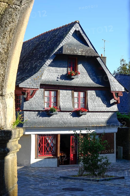 Rue du General de Gaulle in the old town centre of Le Faou with slate-roofed granite houses from the 16th century, Finistere department, Brittany region, France, Europe