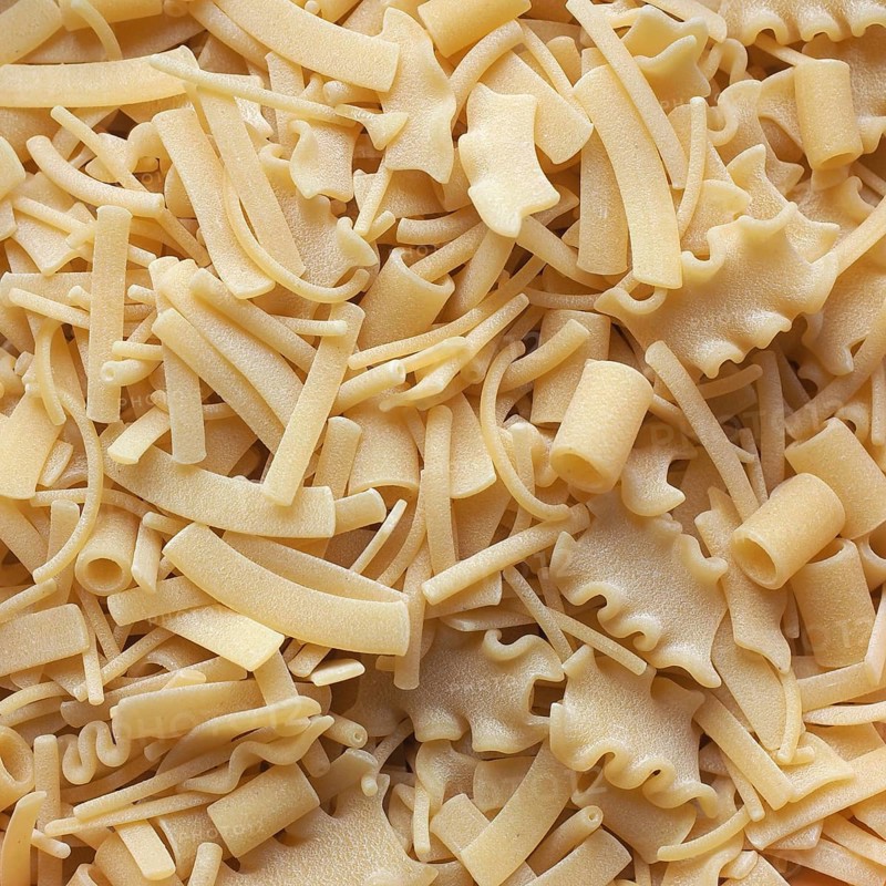 Mixed pasta of various shapes background