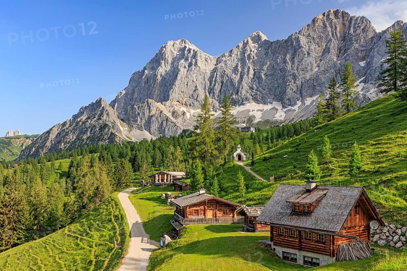 Mountain hut and alp in front of steep mountains in summer, Brandalm, Hoher Dachstein, Austria, Europe