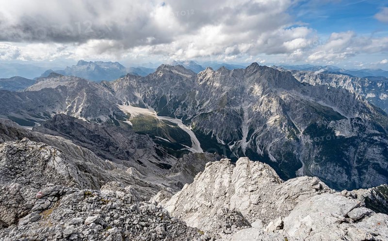 View of Wimbachgries valley and mountain panorama with rocky mountain peak of the Hochkalter, at the summit of the Watzmann Mittelspitze, Berchtesgaden National Park, Berchtesgaden Alps, Bavaria, Germany, Europe