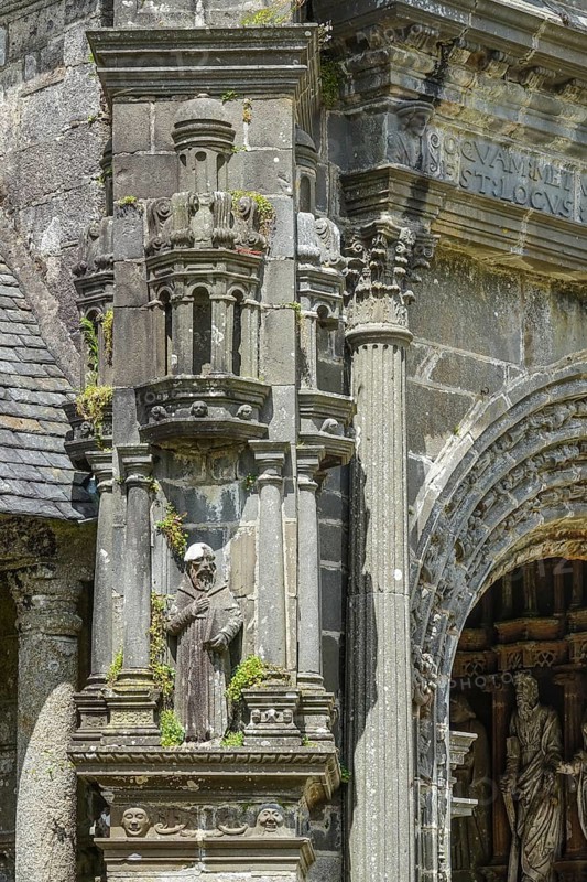 Side portal of the church, Enclos Paroissial parish of Guimiliau, Finistere Penn ar Bed department, Brittany Breizh region, France, Europe