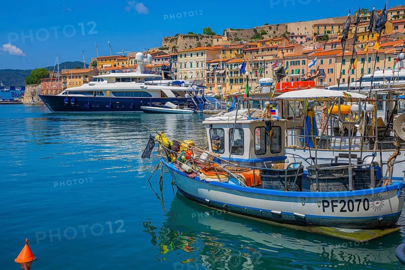 Fishing boats and luxury yachts in the harbour of Portoferraio, Elba, Tuscan Archipelago, Tuscany, Italy, Europe