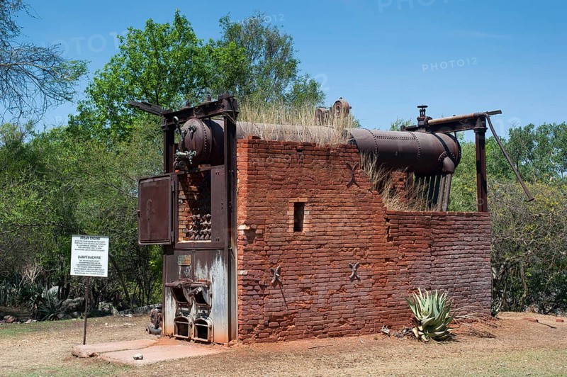 German decommissioned steam engine from 1904 at Lake Otjikoto, used as a pump to supply drinking water to the town of Tsumeb in Namibia