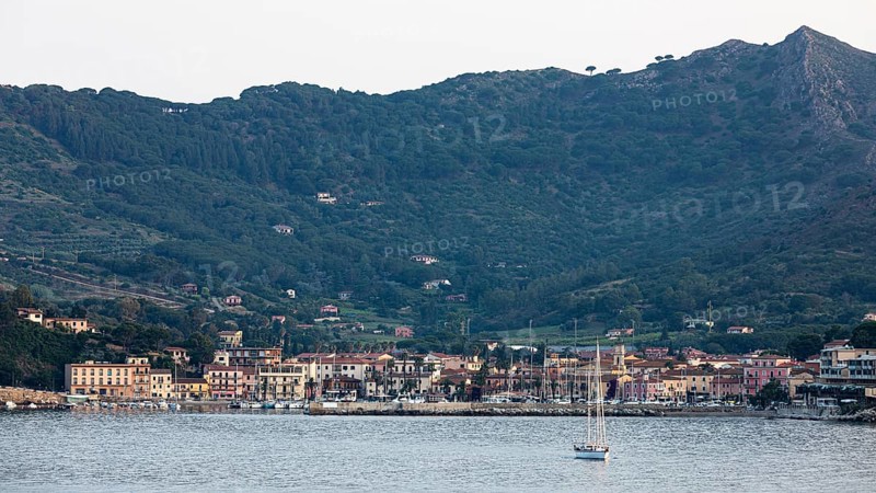 Sailing ship leaving the harbour of Porto Azzurro, Elba, Tuscan Archipelago, Tuscany, Italy, Europe