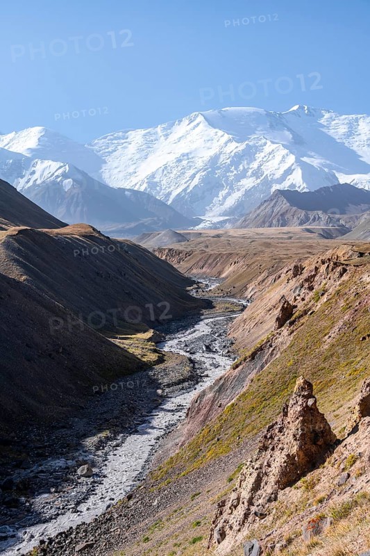 Valley with river Achik Tash between high mountains, mountain landscape with peak Pik Lenin, Osh province, Kyrgyzstan, Asia