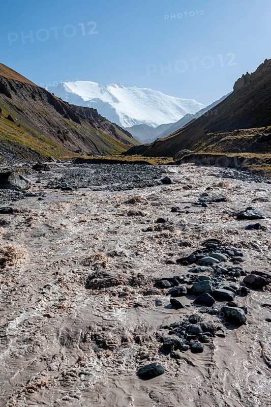 Valley with river Achik Tash between high mountains, mountain landscape with peak Pik Lenin, Osh province, Kyrgyzstan, Asia