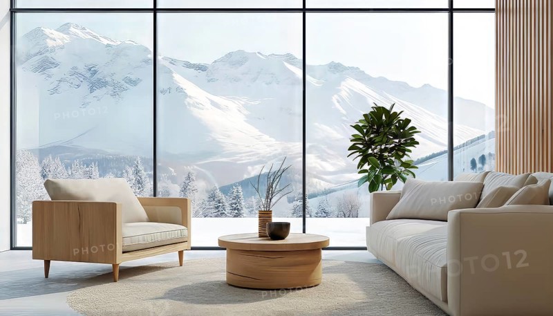 Cozy living room with modern furniture and a breathtaking mountain view through floor-to-ceiling windows, AI generated
