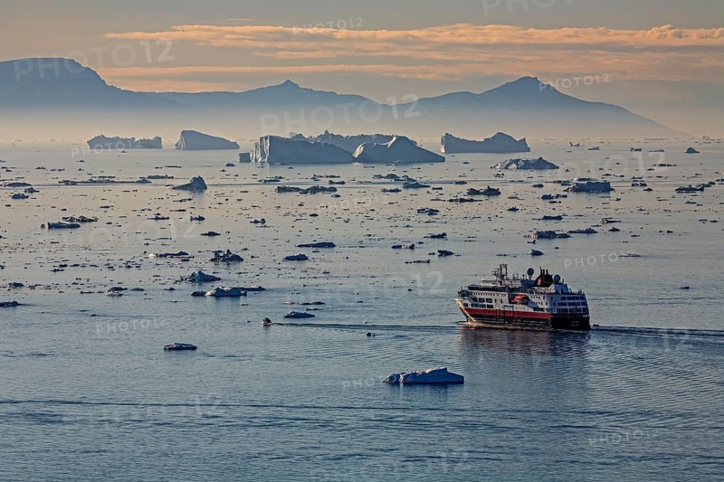 Hurtigruten ship in front of icebergs, reflection, midnight sun, summer, Ilulissat Icefjord, Disko Bay, Greenland, North America