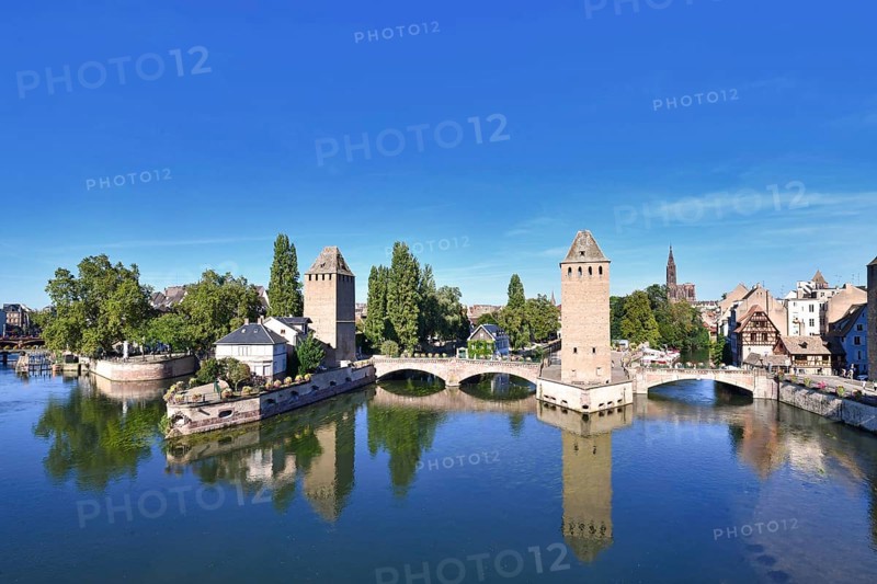 Strasbourg, France, September 2023: Historical tower of 'Ponts Couvert' bridge as part of defensive work erected in the 13th century on the River Ill in 'Petite France' quarter of Strasbourg city, Europe