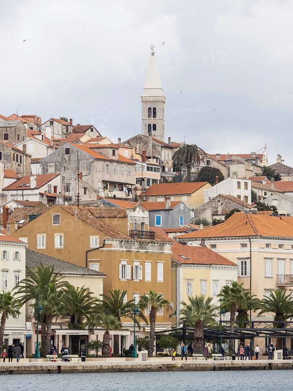 Harbour of Mali Losinj, behind the campanile of the Church of the Nativity of the Virgin Mary, island of Losinj, Kvarner Gulf Bay, Croatia, Europe