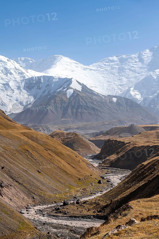 Valley with river Achik Tash between high mountains, mountain landscape with peak Pik Lenin, Osh province, Kyrgyzstan, Asia