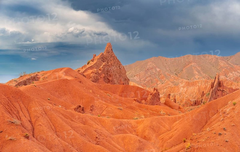 Eroded mountain landscape, sandstone cliffs, canyon with red and orange rock formations, Konorchek Canyon, Chuy, Kyrgyzstan, Asia