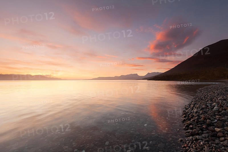 Laporten in northern Sweden, Lapland. Dawn in Bjoerkliden on Lake Tornetraesk