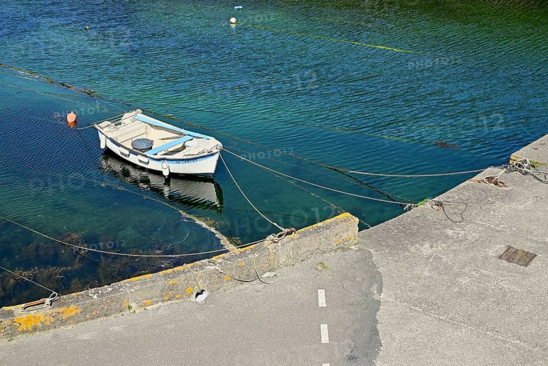 Boat in the small inland harbour of Lampaul, Ouessant Island, Finistere, Brittany, France, Europe