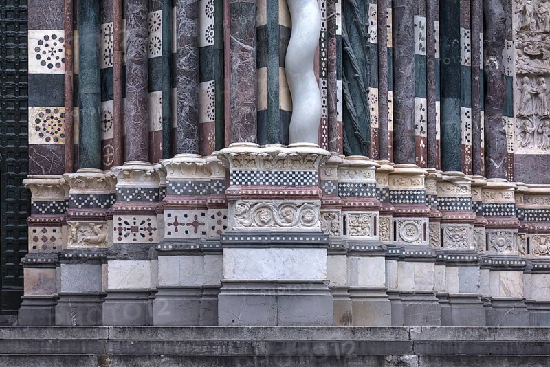Decorative bases of the columns on the entrance facade of San Lorenzo Cathedral, opened in 1098, Piazza S. Lorenzo, Genoa, Italy, Europe