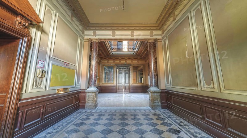 A hallway in a historic building with chequered floor tiles and pillar panelling, Villa Woodstock, Lost Place, Wuppertal, North Rhine-Westphalia, Germany, Europe