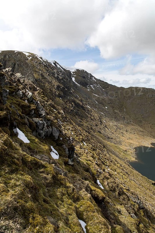 Helvellyn mountain peak and Red Tarn corrie lake, Lake District, Cumbria, England, UK
