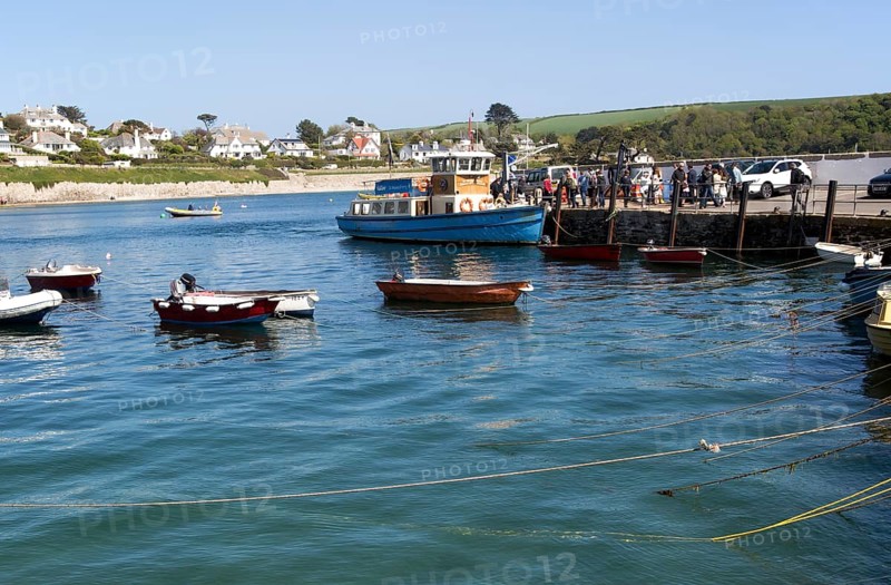 Ferry boat and dinghies in the harbour, St Mawes, Cornwall, England, UK