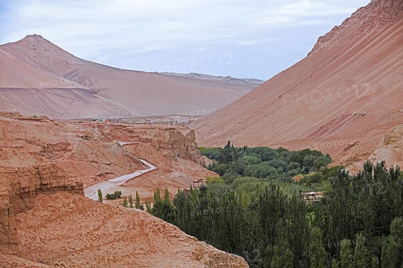 Road winding through the Flaming Mountains, Gaochang Mountains in the Tian Shan of Xinjiang near Turpan, Turfan, Tulufan, China, Asia