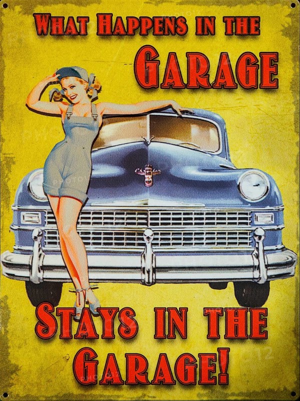 Old enamel sign 'What happens in the garage stays in the garage' woman posing by car