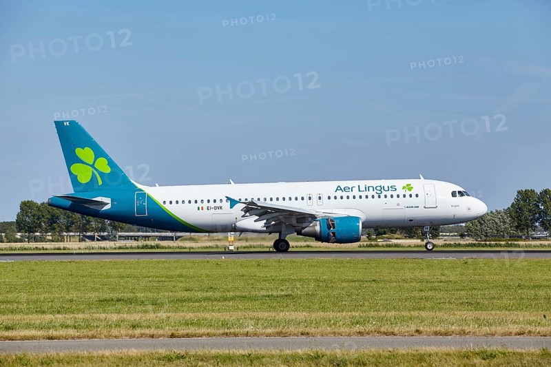Aer Lingus Airbus A320-214 with registration EI-DVK lands on the Polderbaan, Amsterdam Schiphol Airport in Vijfhuizen, municipality of Haarlemmermeer, Noord-Holland, Netherlands