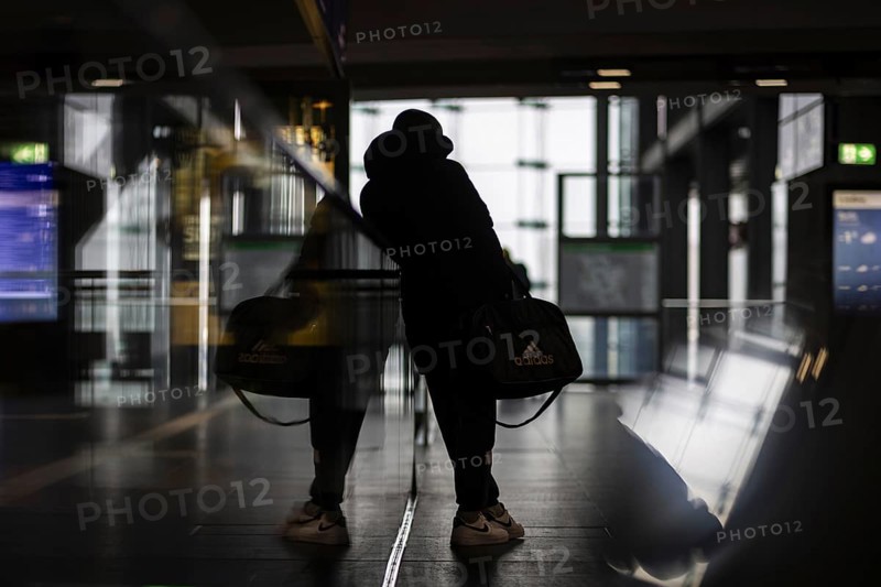 A person stands waiting at Berlin Central Station. Today is the second day of the strike by the train drivers' union GDL, on which train cancellations are to be expected. Berlin, 11.01.2024